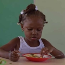 Kinderopvang Suriname kind aan het eten